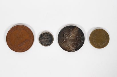 Quatre médailles :
- deux en argent (min....