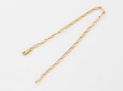Fin bracelet gourmette en or jaune (750)...