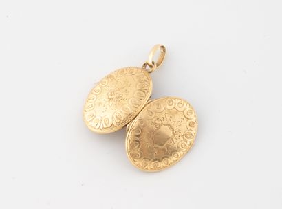 Yellow gold (750) guilloché floral motif...