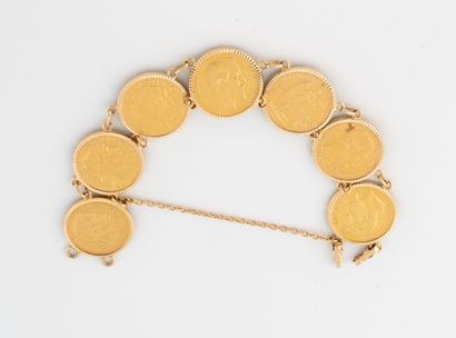 Bracelet en or jaune (750) ornée de 7 pièces...