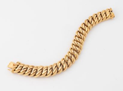 American-style bracelet in yellow gold (750).
Ratchet...