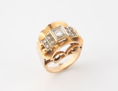 Bridge ring in yellow gold (750) and platinum...