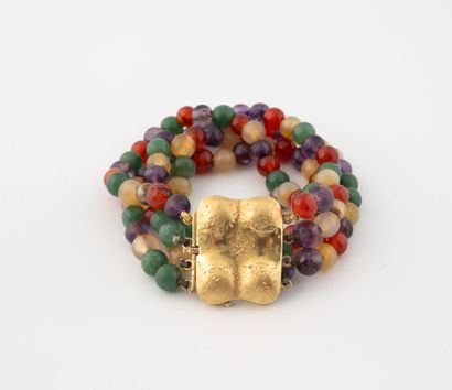 Bracelet à quatre rangs de billes de quartz...