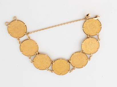 Bracelet en or jaune (750) ornée de 7 pièces...