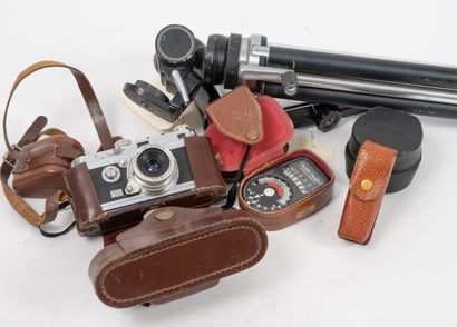 - Black Canon A-1 camera with Canon FD 1.4/50...