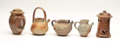 Stoneware lot including:
-A teapot.
-Two...