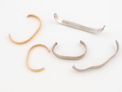 Set of wedding band fragments in yellow and...