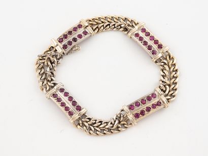 White gold (750) bracelet formed of two gourmette...