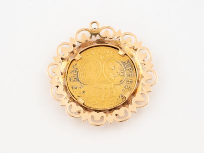 Yellow gold (750) openwork pendant decorated...