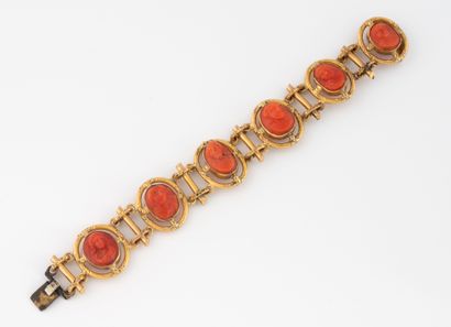 Gilded metal bracelet featuring 6 red coral...