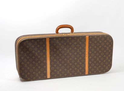 Louis Vuitton
Squash case in Monogram canvas...