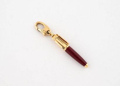CARTIER
Pendentif stylo en or jaune (750).
Signé...