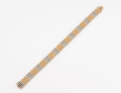 Bracelet articulé en or jaune (750) et platine...