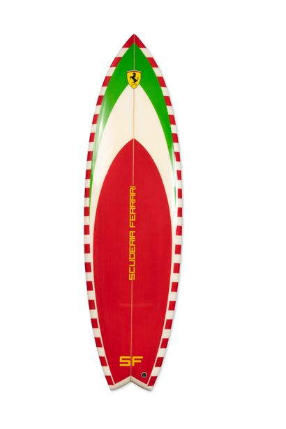 FERRARI
Fiberglass surfboard with four fins....