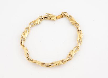 Bracelet en or jaune (750) articulé composé...