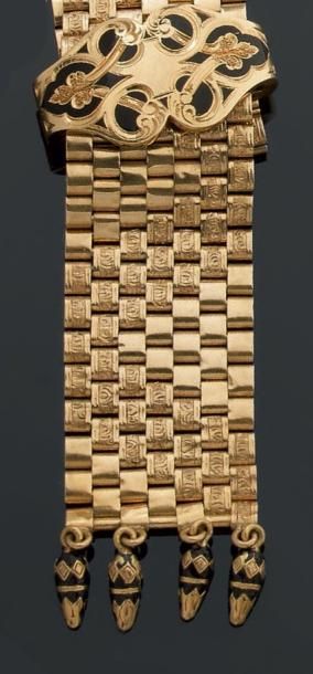 Bracelet ceinture articulé en or jaune gravé...