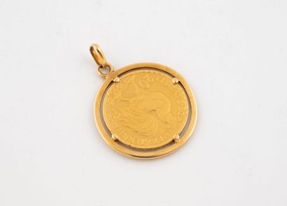 Gold pendant holding a 20-franc coin, set...