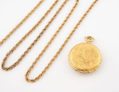 Yellow gold (750) collar watch.
White enameled...
