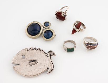 Jewelry lot including:
-Four silver rings...