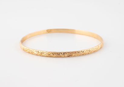 Bracelet jonc rigide en or jaune (750) à...