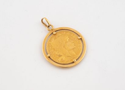 Gold pendant holding a 20-franc coin, set...