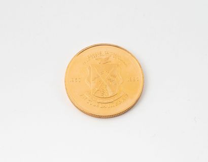 Une pièce de 100.000 francs or Guinéen, 1er...