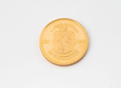 Une pièce de 100.000 francs or Guinéen, 1er...