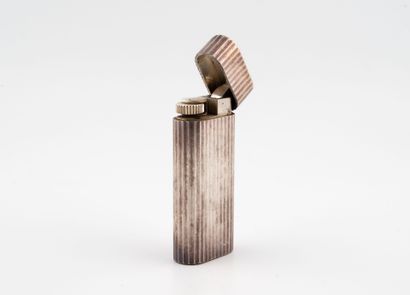 CARTIER
Grooved silver (925) lighter.
Signed...