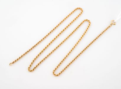 Collier en or jaune (750).
Poids : 13,5 g....