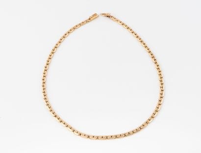 Collier en or jaune (750) à maille gourmette...