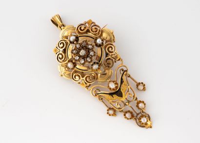 Yellow gold (750) openwork rosette-shaped...