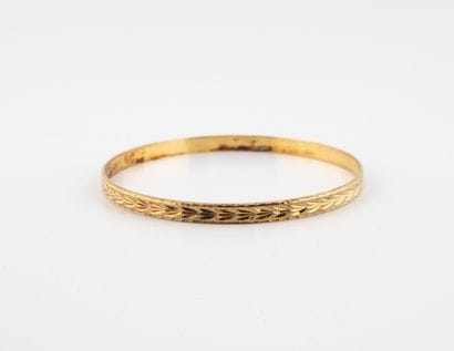 Gilt silver (min.800) bangle with a frieze...