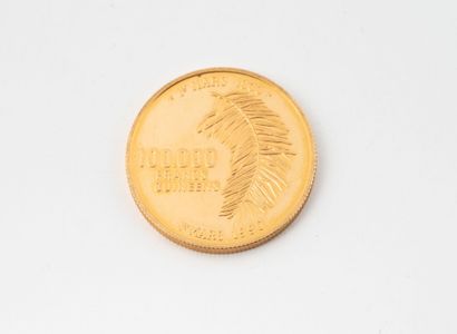 Une pièce de 100.000 francs or Guinéen, 1er...