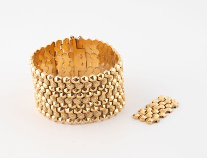 Bracelet souple articulé en or jaune (750)...