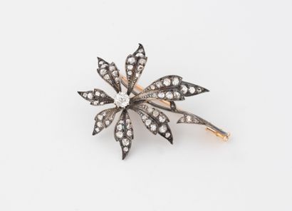 Yellow gold (750) and silver (min.800) flower...