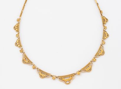 Yellow gold (750) drapery necklace with baguette...