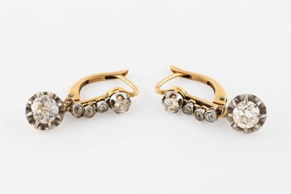 Pair of yellow gold (750) and platinum (850)...