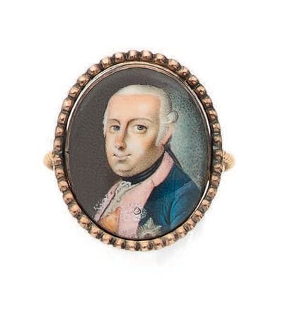 Bague politique en or jaune (385) au plateau...