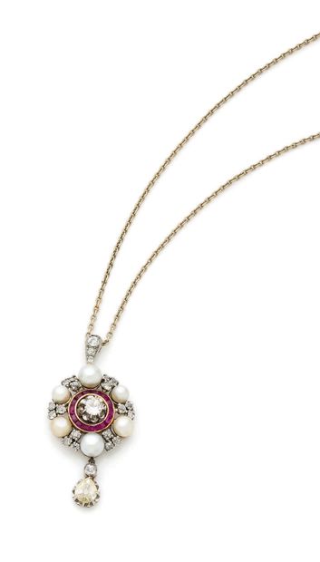 Pendentif en or jaune (750) et platine (850)...