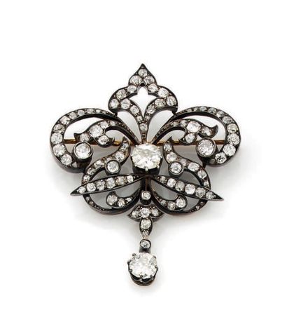 Belle broche en or jaune (750) et argent...