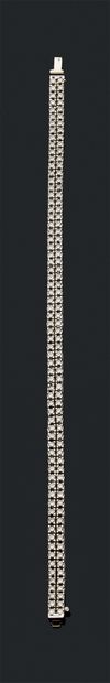 Bracelet rivière en or gris (750) ornée de...