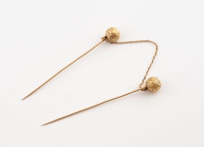Two yellow gold (750) chased ball corsage...