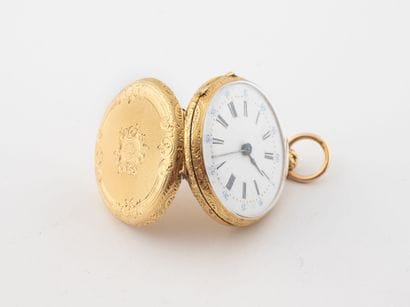 Small neckwatch in yellow gold (750) with...