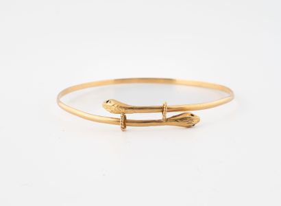Two snake heads in yellow gold (750).
Gross...