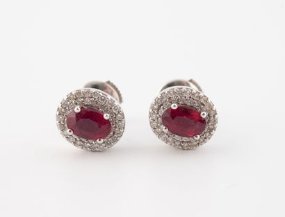 Paire de boucles d'oreille or gris (750)...