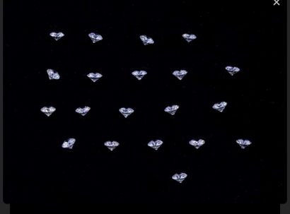 Lot of 18 diamonds on paper.
Total weight:...