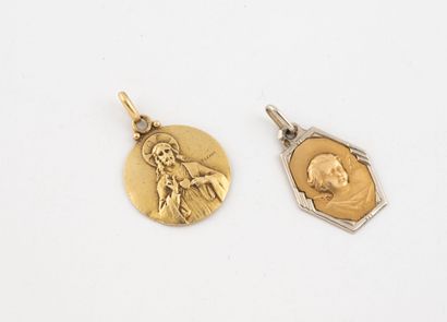 Two medals in yellow gold (750) and platinum...