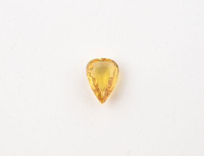 Pear-cut yellow sapphire on paper.
Weight:...