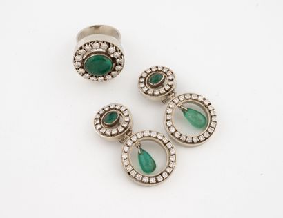 Half set in 585 white gold comprising :
-...