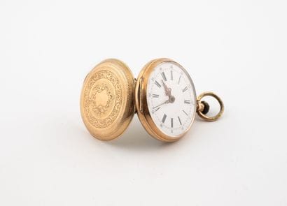 Yellow gold (585) collar watch.
White enamel...